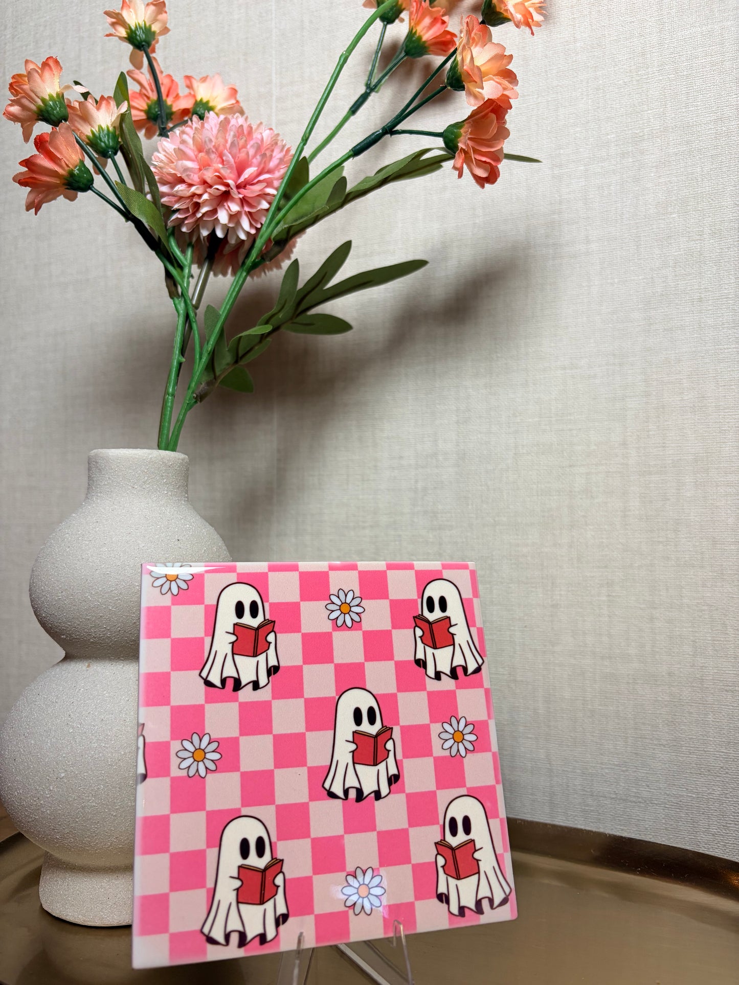 Tegeltje “reading ghosties''