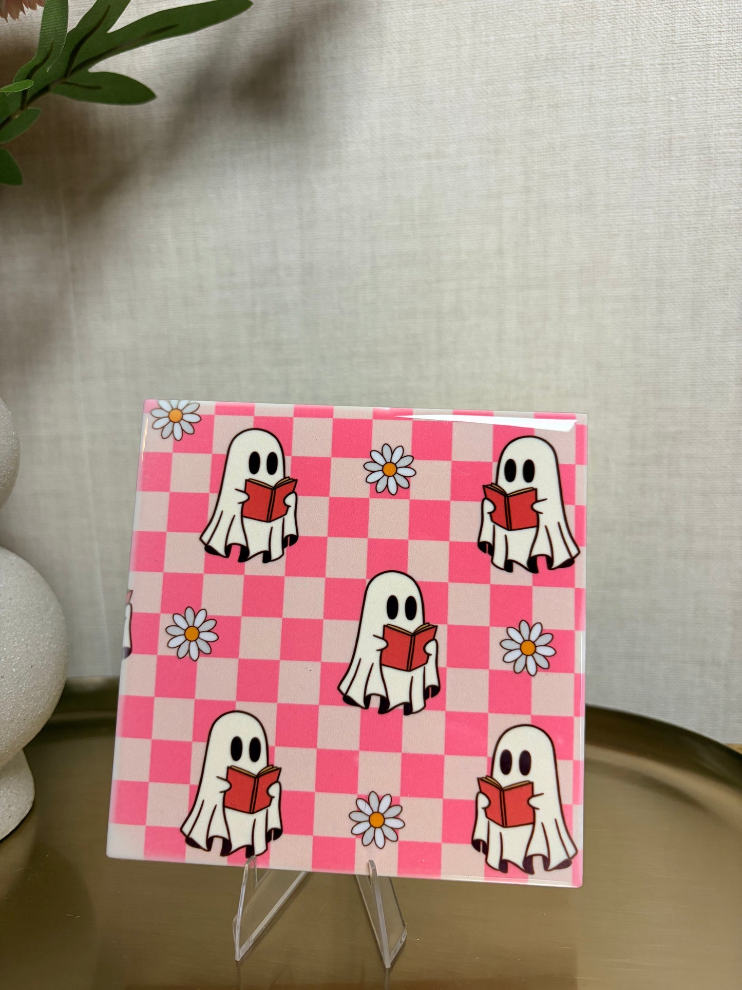 Tegeltje “reading ghosties''